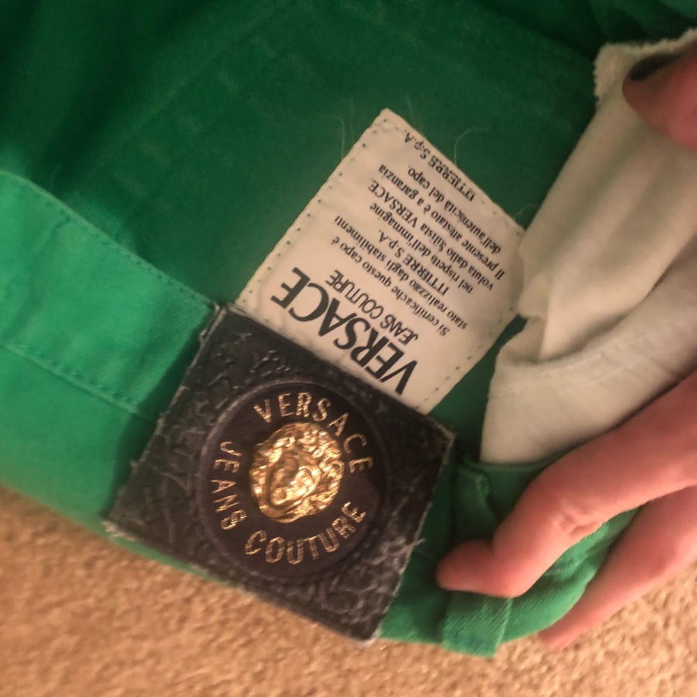 Green Versace couture jeans